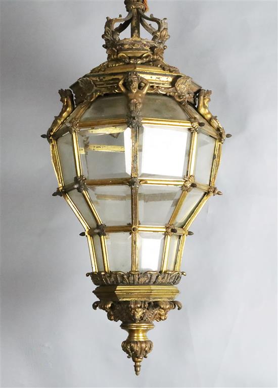A late 19th century Louis XIV style Versailles type ormolu and bevelled glass lantern, Dia. 1ft 2in. Drop. 3ft.